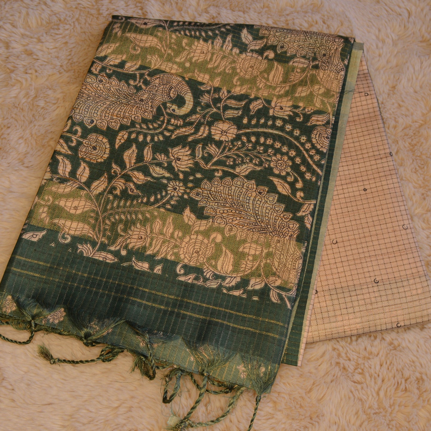 Green semi tussar checks floral border saree