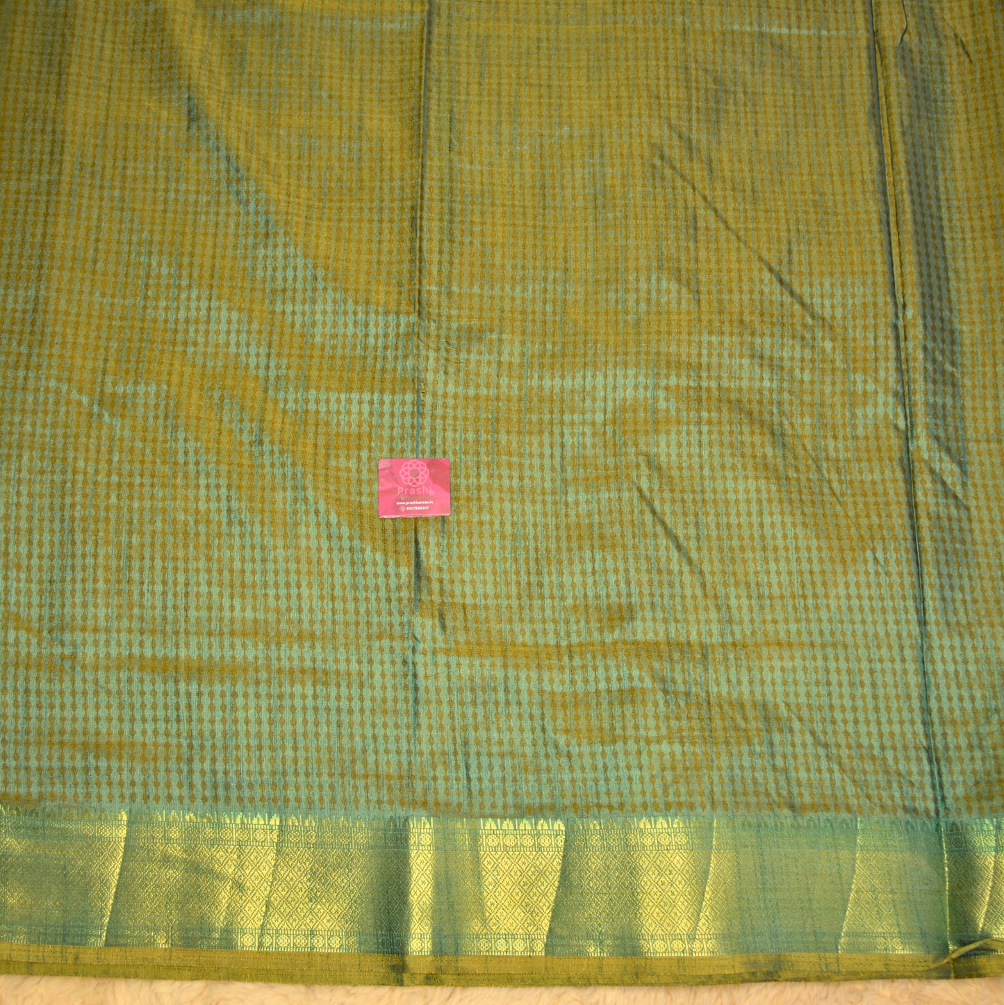 Brick red with green patola saree