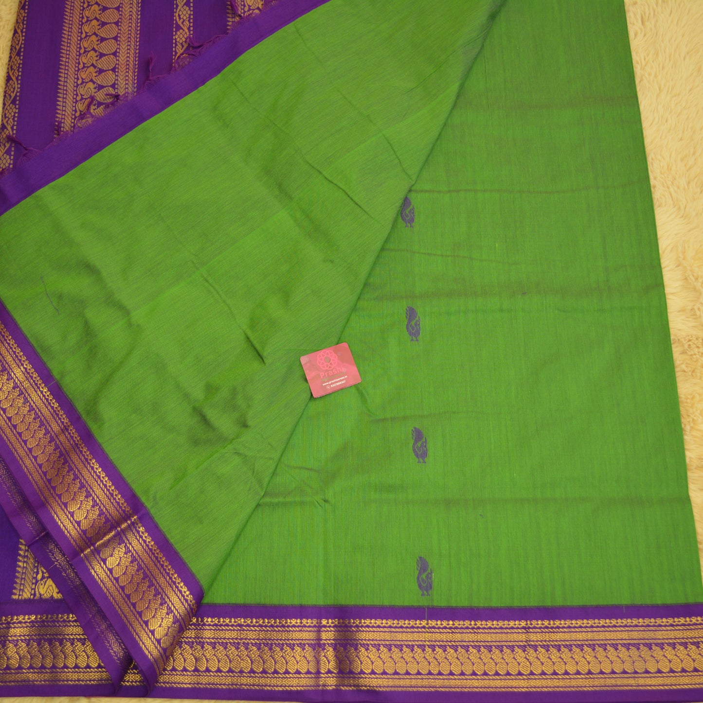 Green handloom kalyani cotton saree with purple contrast