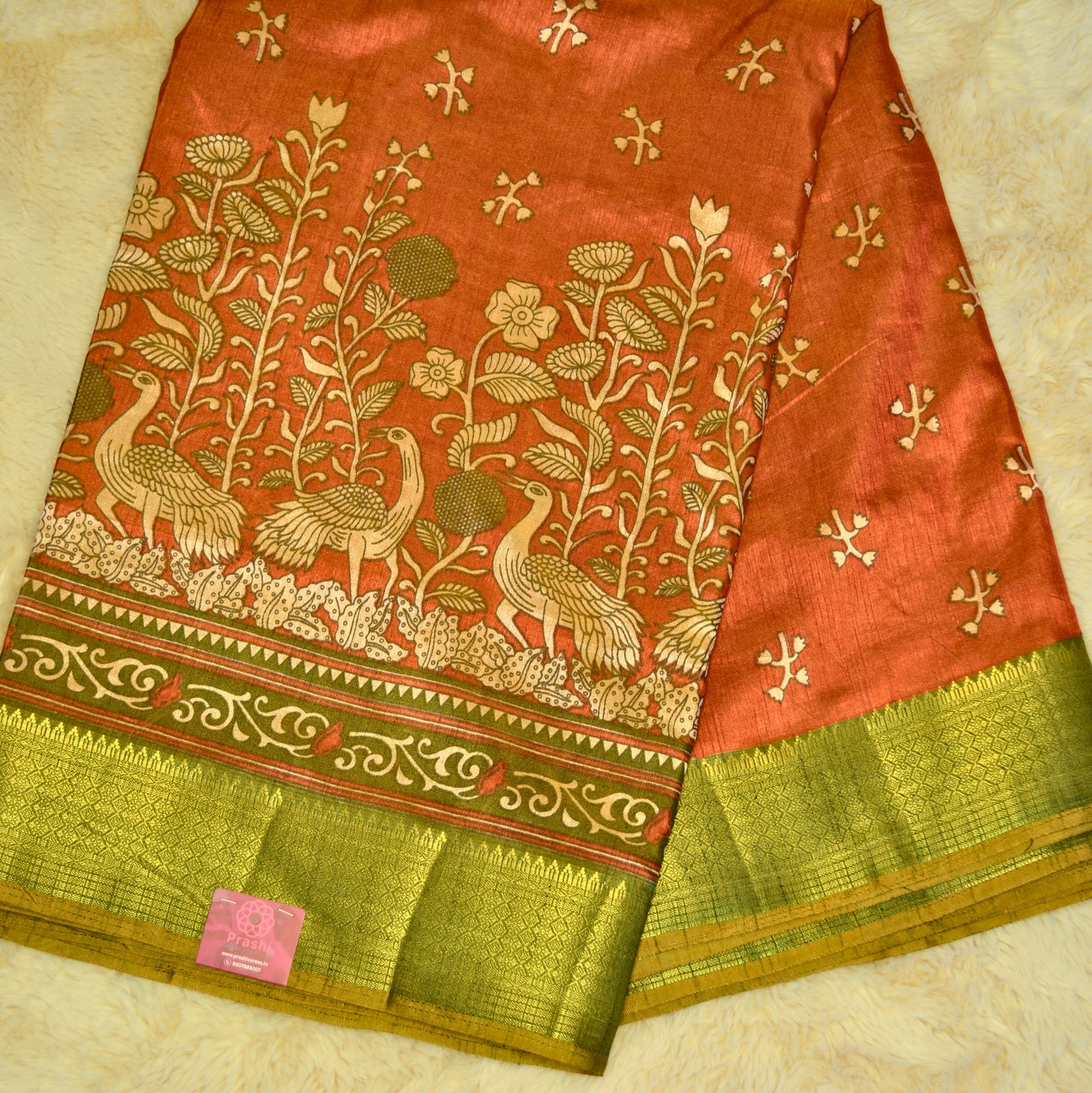 Brick red with green patola saree