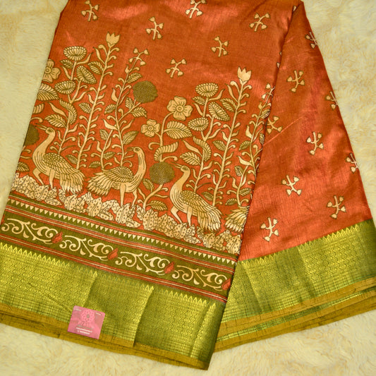 Brick red with green patola saree