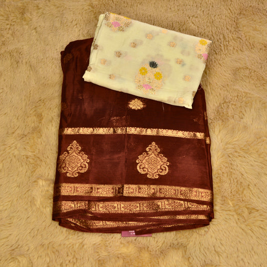 brown and half white blouse Chinnon butta border saree