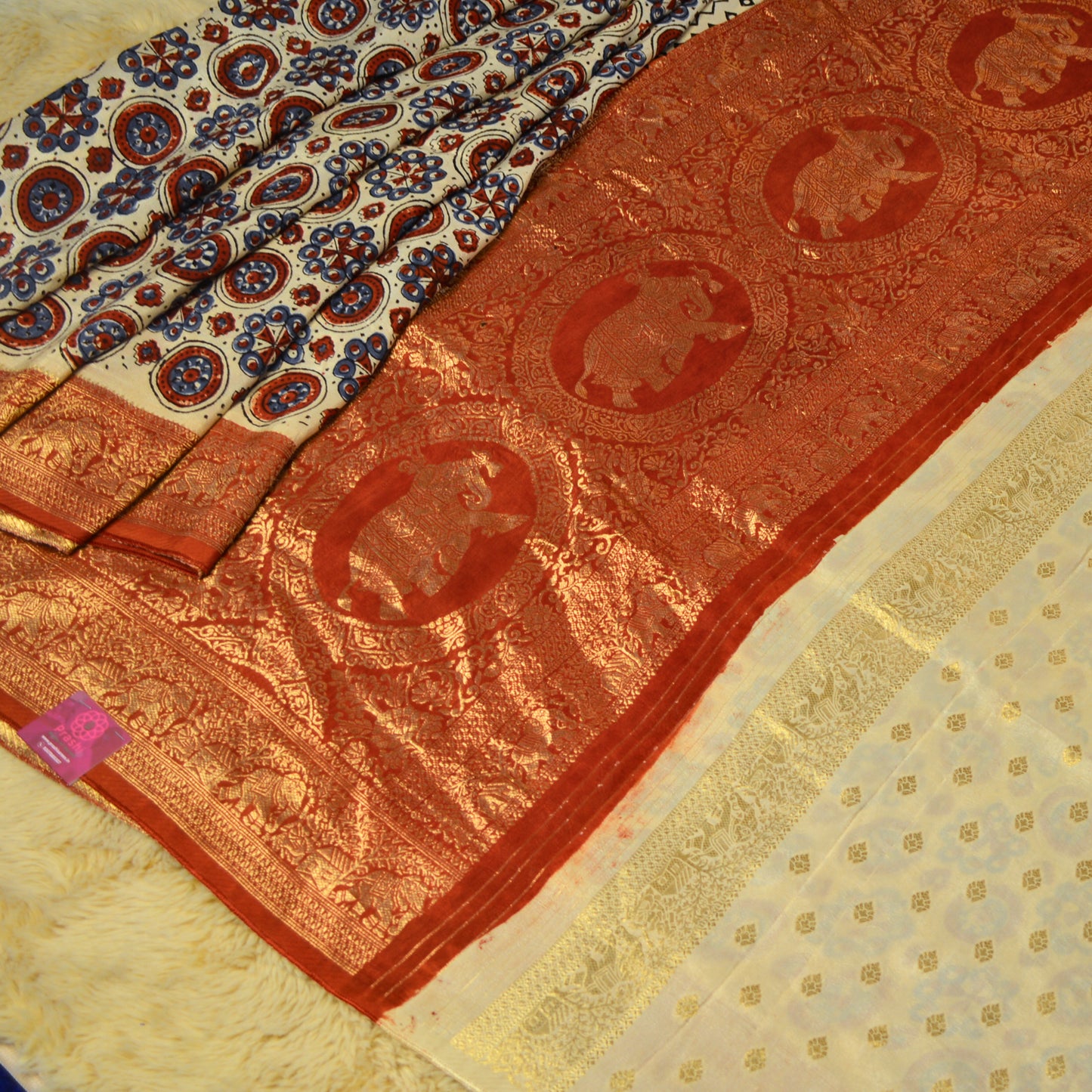 Half-white dola silk ajrakh handblock printed saree