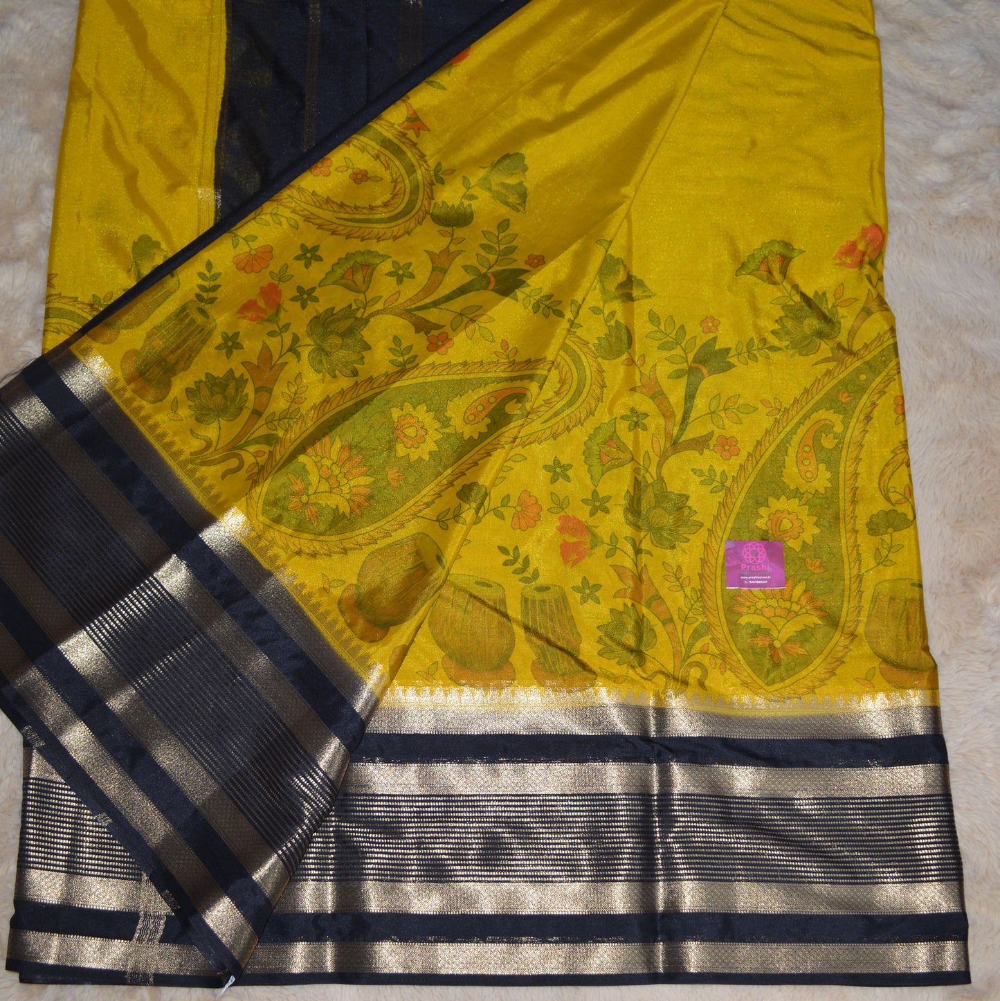 Yellow with black semi crepe kalamkari saree