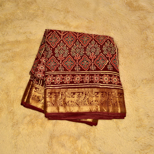 Maroon Dola silk saree with ajrakh handblock print