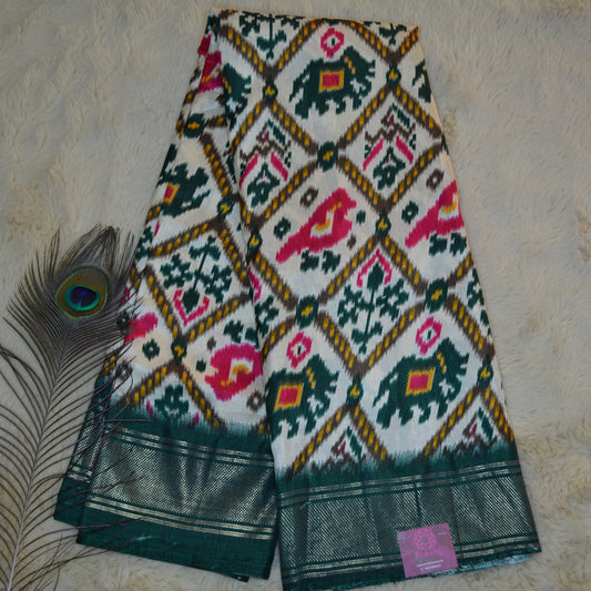 Half-white with green ikkat semi dola saree