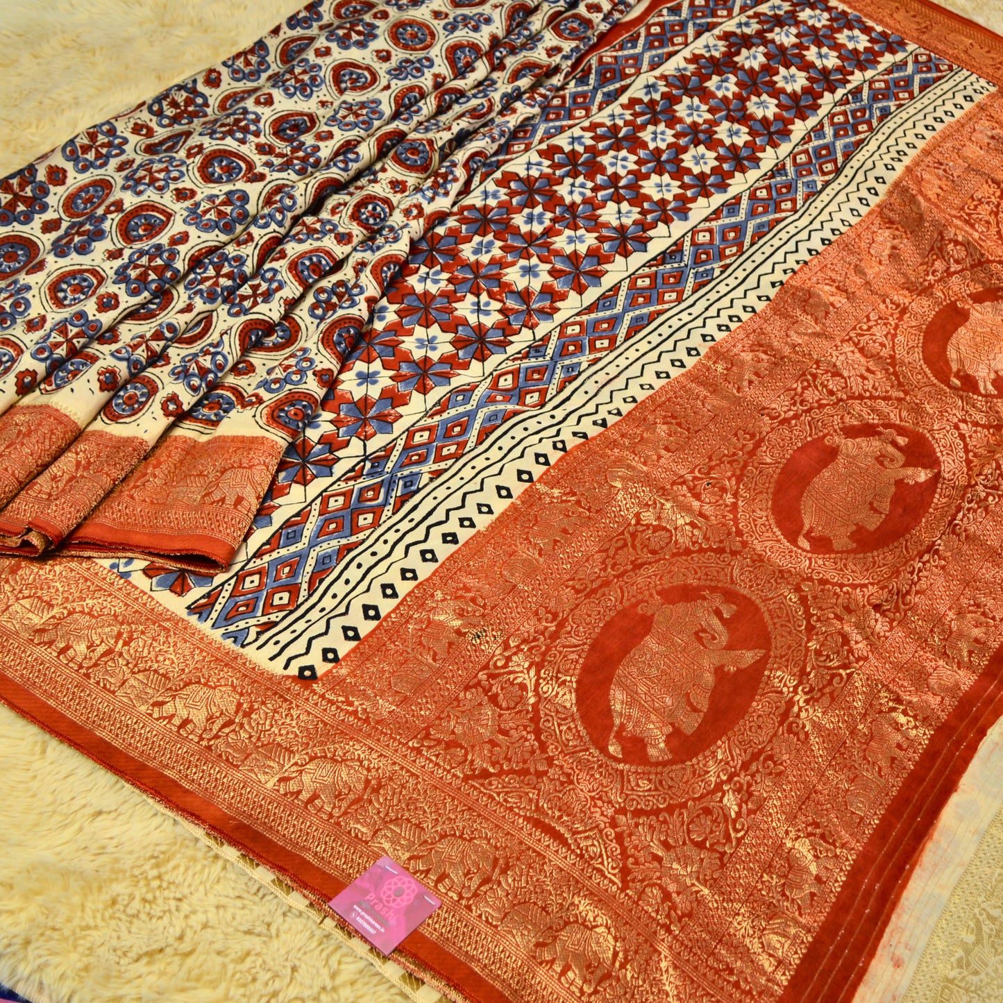 Half-white dola silk ajrakh handblock printed saree