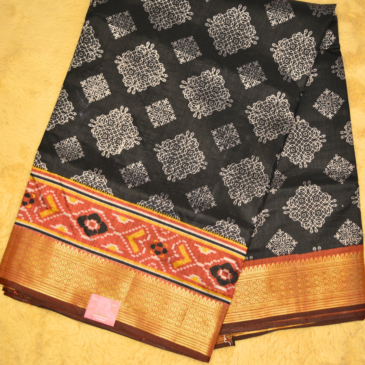 Black with maroon patola saree