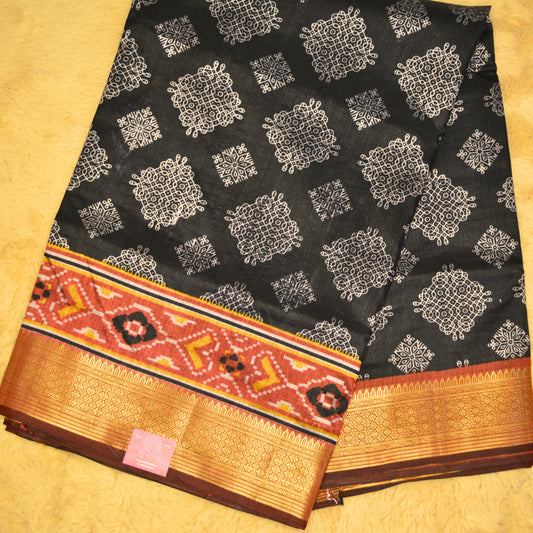 Black with maroon patola saree