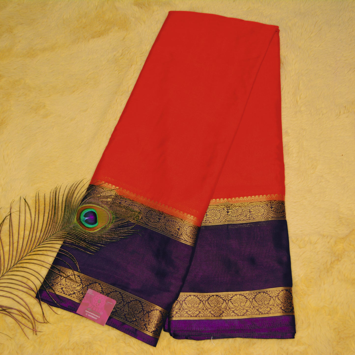 ORANGE semi mysore crepe saree with bentex border.