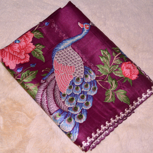 Magenta tissue saree with peacock embroidery.