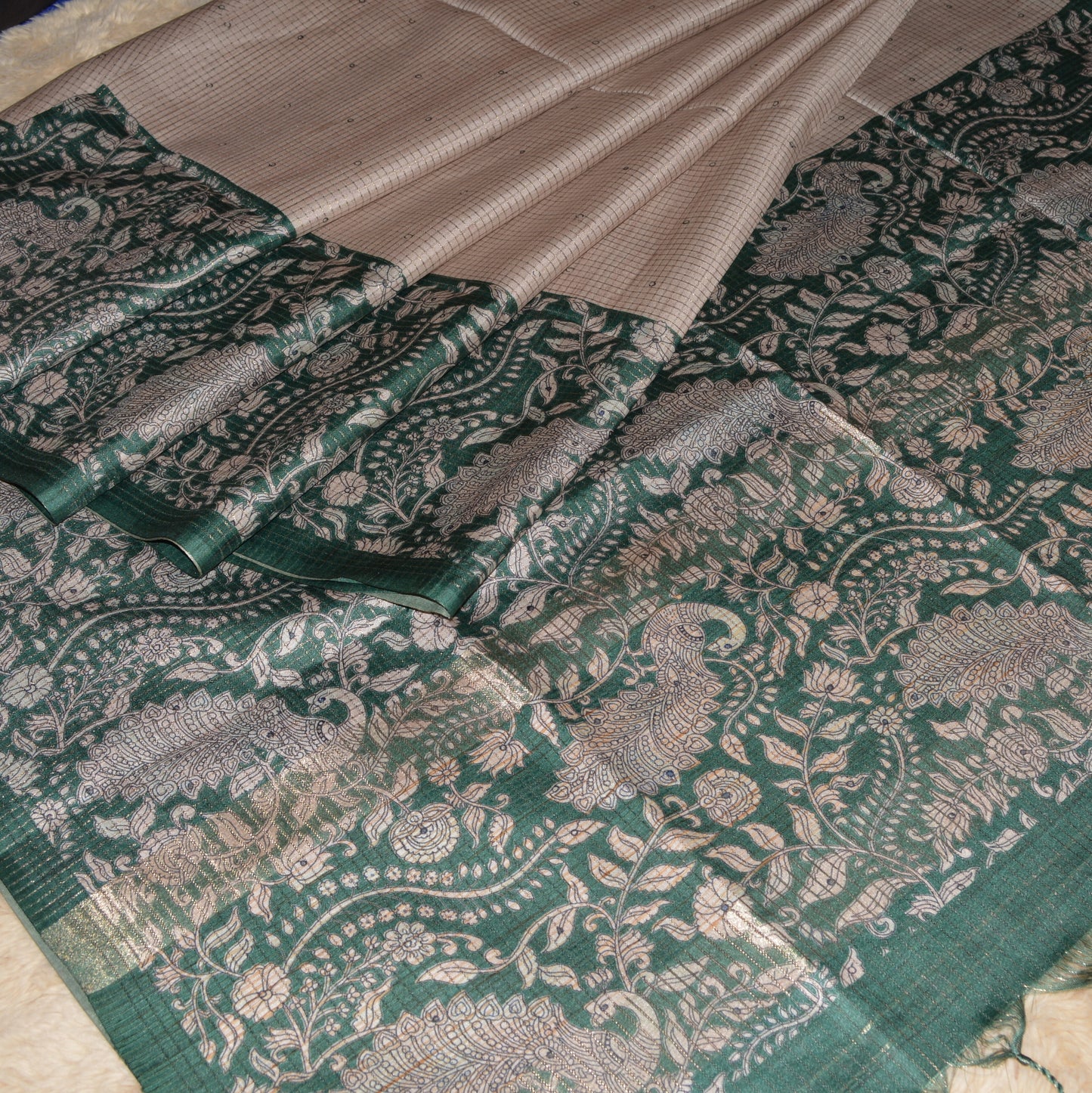 Green semi tussar checks floral border saree