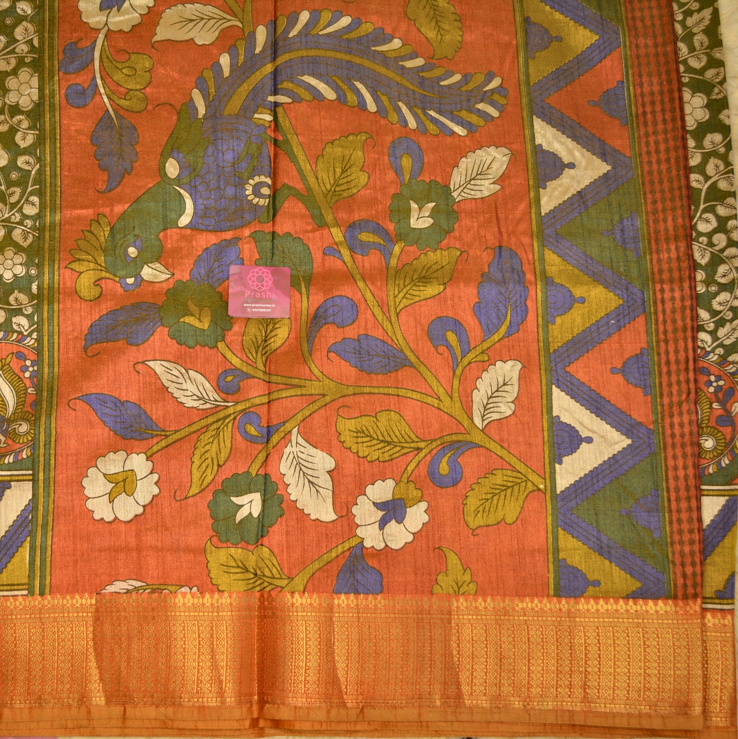 Mehandi green with rust orange patola saree