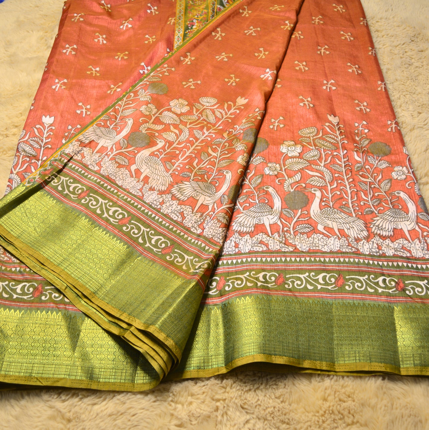 Brick red with green patola saree