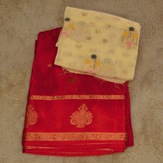 red and half white chinnon butta border saree