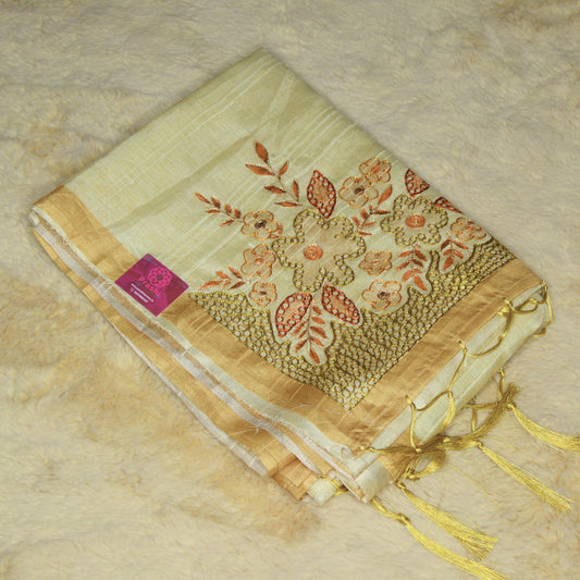 Beige tussar cut work embroidery saree with golden contrast