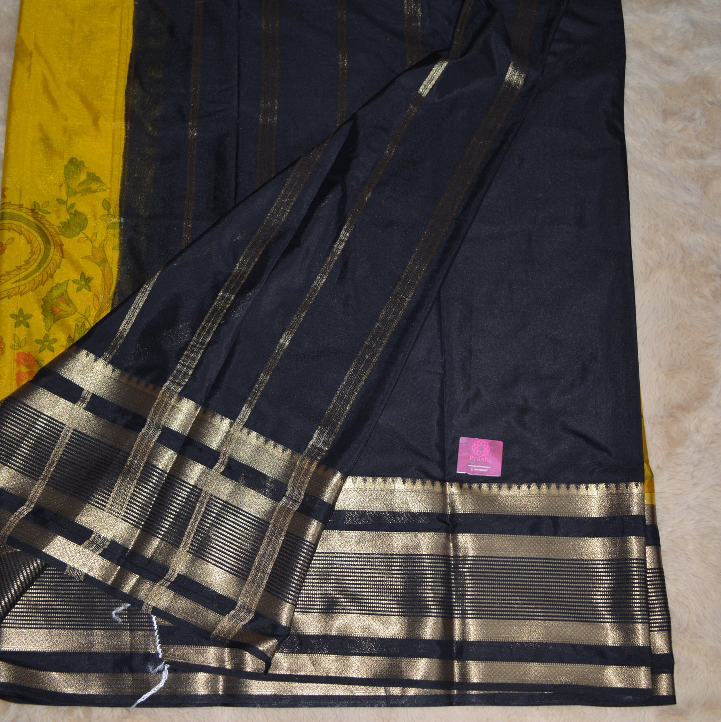 Yellow with black semi crepe kalamkari saree