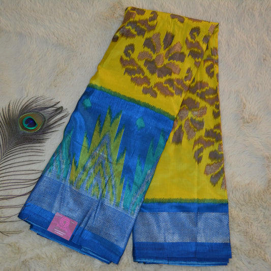 Yellow with blue ikkat semi dola silk saree
