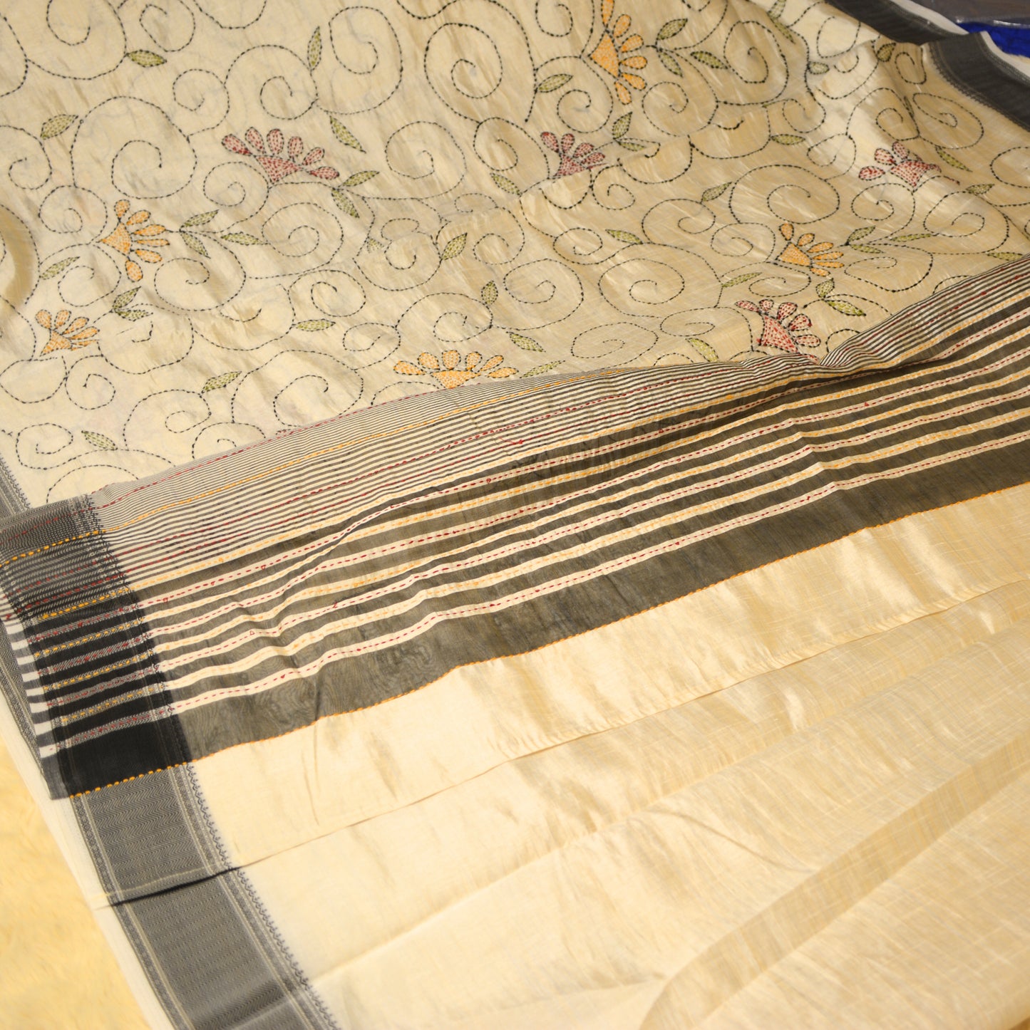 Half-white tussar saree with kanths embroidery