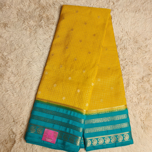 Yellow with rama green semi mysore crepe checks