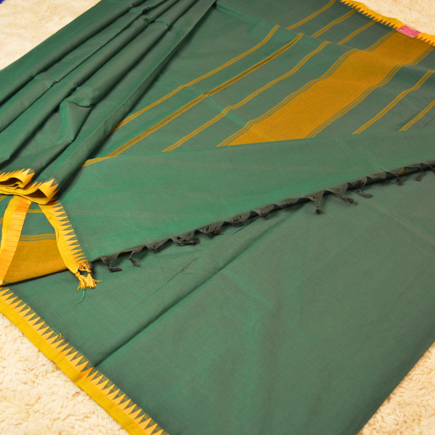 Bottle green kanchi cotton temple border saree