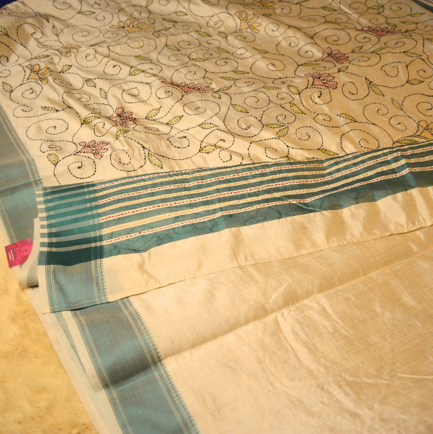 Half-white tussar saree with kantha embroidery